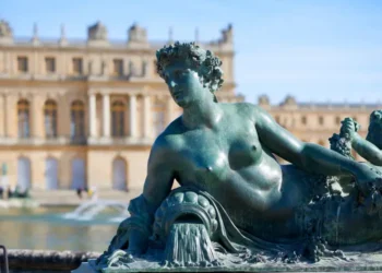 A bronze sculpture in the garden of Versailles Palace, France.