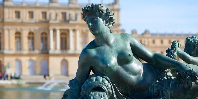 A bronze sculpture in the garden of Versailles Palace, France.