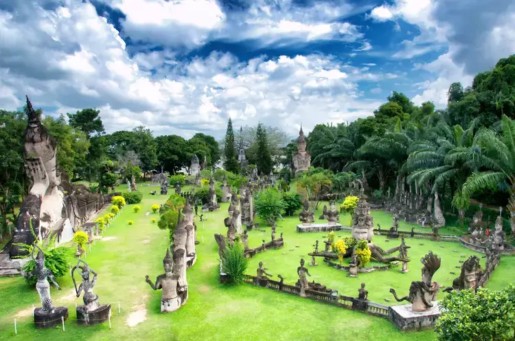 View of mythology and religious statues at Wat Xieng Khuan Buddha park. Vientiane