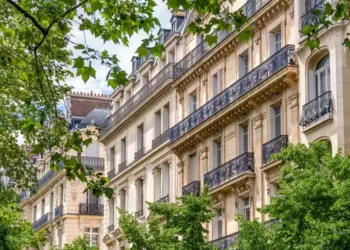 Residential building along a street in Paris, France. overseas rentals