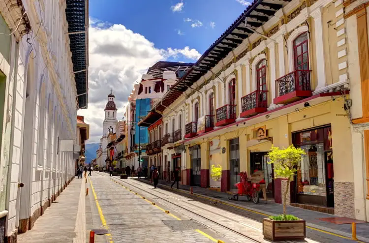 Colonial buildings with red balconies in Cuenca, infrastructure in ecuador