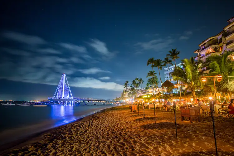 Puerto Vallarta Pier at Night. taxes in mexico