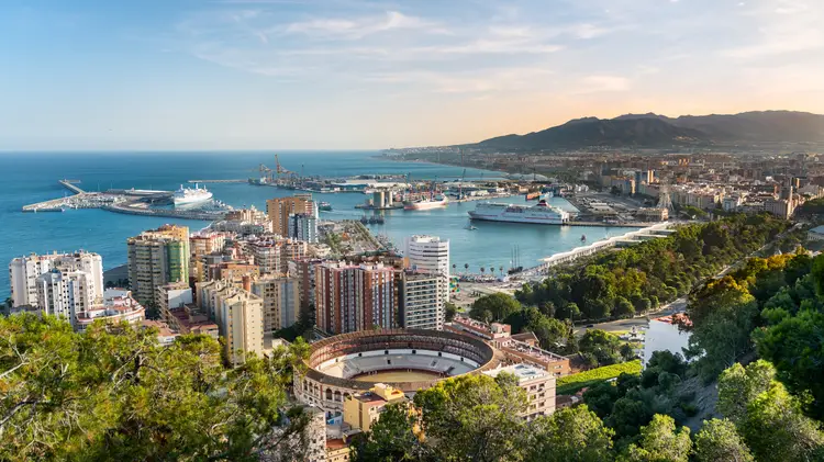 Aerial panoramic view of Malaga city, Andalusia, Spain in a beautiful summer day Por Lukasz