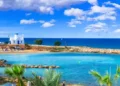 Cyprus island - best beaches. Scenic Louma beach with little church. Elite Retirement Havens