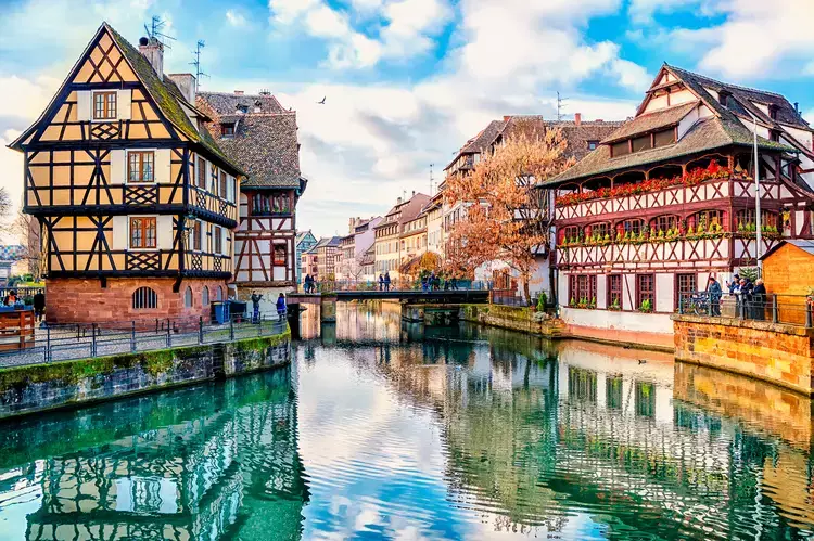 Traditional half-timbered houses on the canals district La Petite France in Strasbourg, UNESCO World Heritage Site, Alsace. move to France