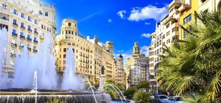 Valencia fountain and historic buildings. best places to retire in the world