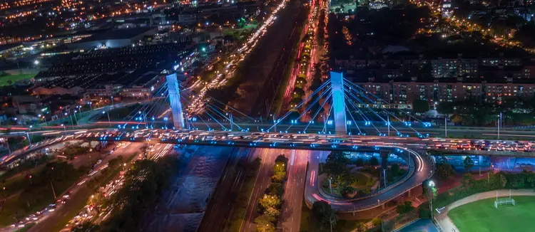 Night city bridge 4 south medellin illuminated highway. work in colombia