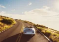 Couple in convertible speeding.