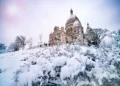 Winter snow day view Sacre-Coeur Montmartre Paris