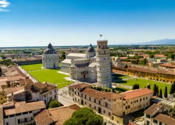 Aerial view at tower of Pisa in Italy on a sunny day. best place to retire in italy 2025