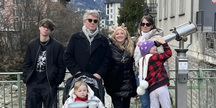 Lief Simon and Kathleen Peddicord pose with their family during a winter trip to Chamonix in 2025.
