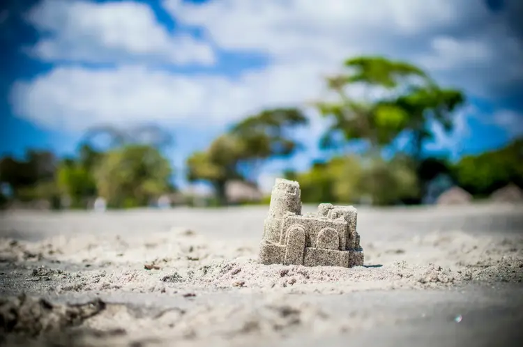 Palm trees, sand castle o a tropical beach. panama city beaches