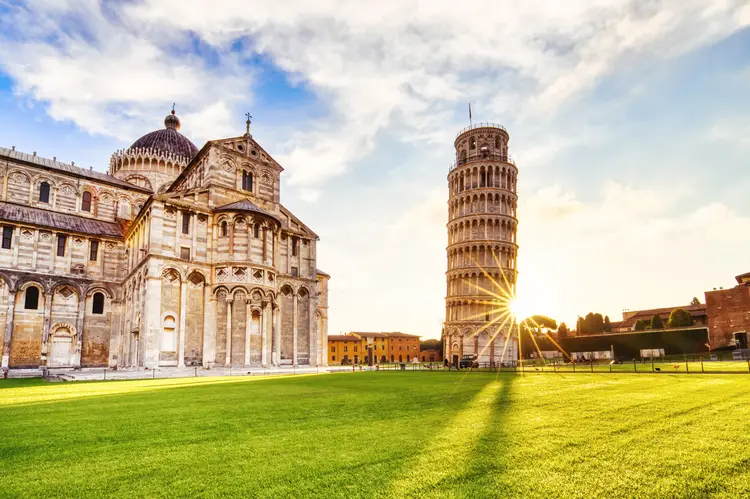 Pisa Leaning Tower Torre di Pisa and the Cathedral Duomo di Pisa at Sunrise, Pisa. cost of living budgets