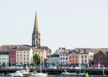 church steeple above colorful irish village of waterford ireland