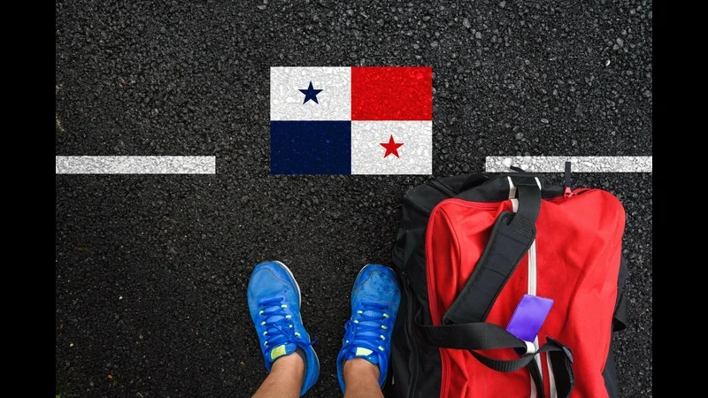 Panama Panamanian flag on road, man with blue running shoes. boca chica