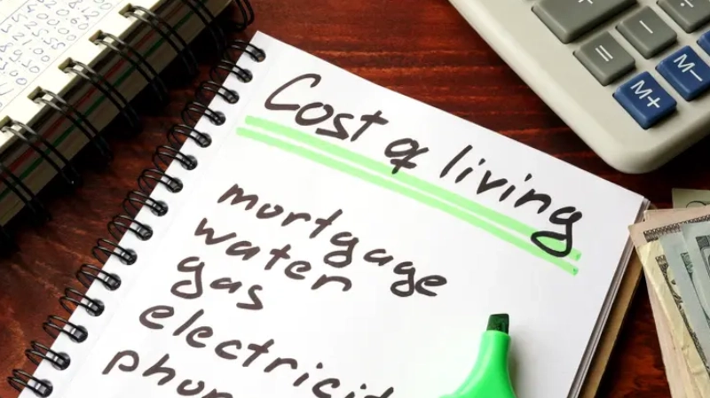 Cost of living written in a notebook and calculations of home finances. cost of living in panama