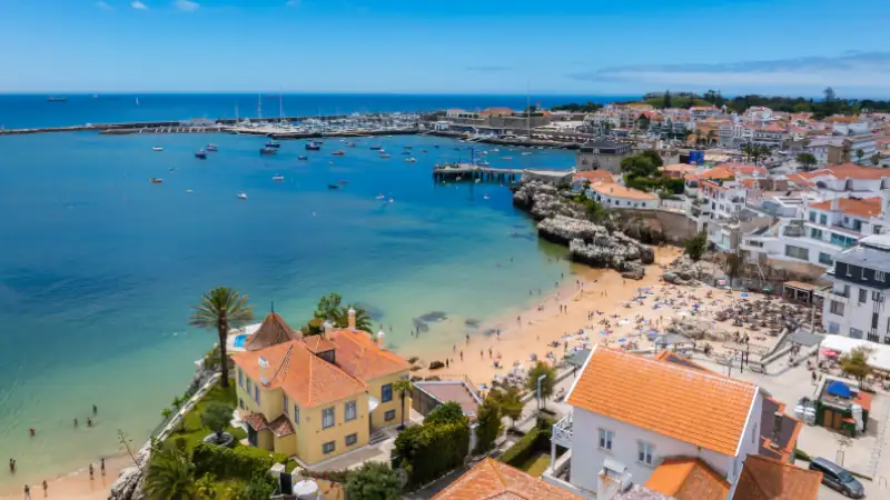 Aerial panoramic view of Cascais. 30km west of Lisbon on the portuguese riveira, cascais, Portugal. Drone aerial view of Praia da Rainha and historic city centre of Cascais, Portugal