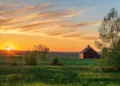 sunrise over farm Stock Photo