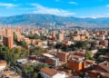 Panoramic view to Medellin, Laureles and El Poblado districts, Colombia, sunny day with clear blue sky