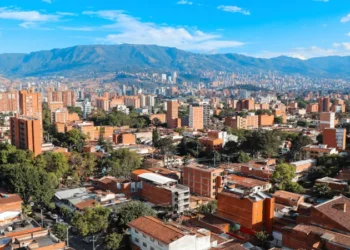 Panoramic view to Medellin, Laureles and El Poblado districts, Colombia, sunny day with clear blue sky