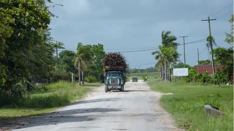 Fully loaded Sugarcane Truck on road in Orange Walk, Belize.