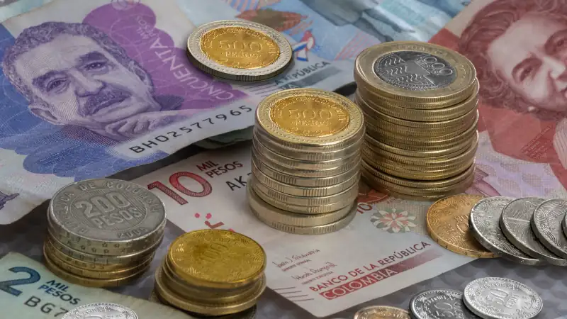 Colombian banknotes and coins of different denominations, Colombia,