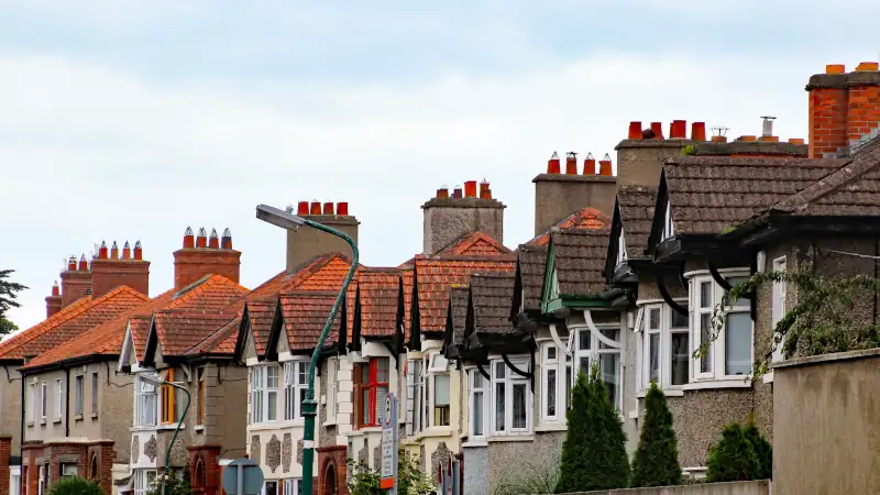 Facades and chimneys of typical townhouses in Dublin, Ireland.