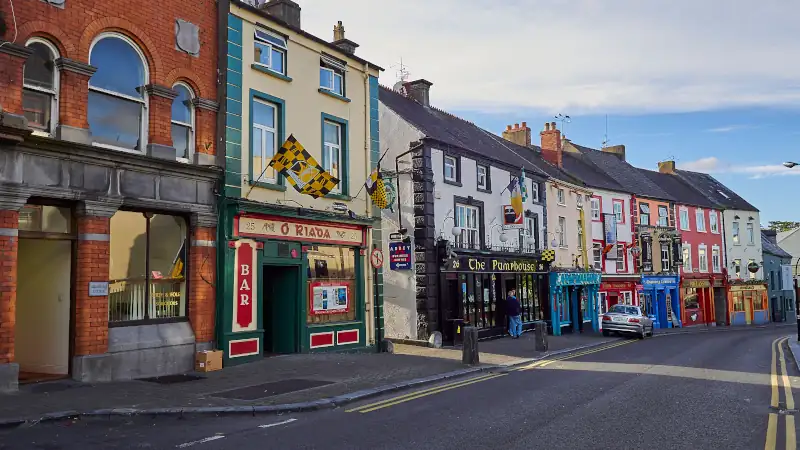 houses and shop front in the streets of Kilkenny on a bright and sunny day.