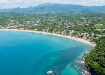Lo de marcos showing crystal clear waters and sandy beach, a typical mexican village on the riviera nayarit