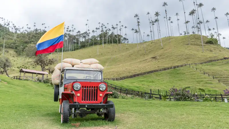 Red car with Colombian flag