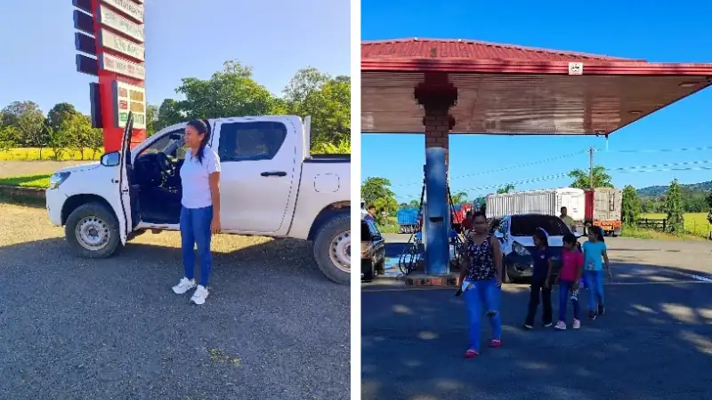 roadside stop, with a woman standing by a white pickup truck