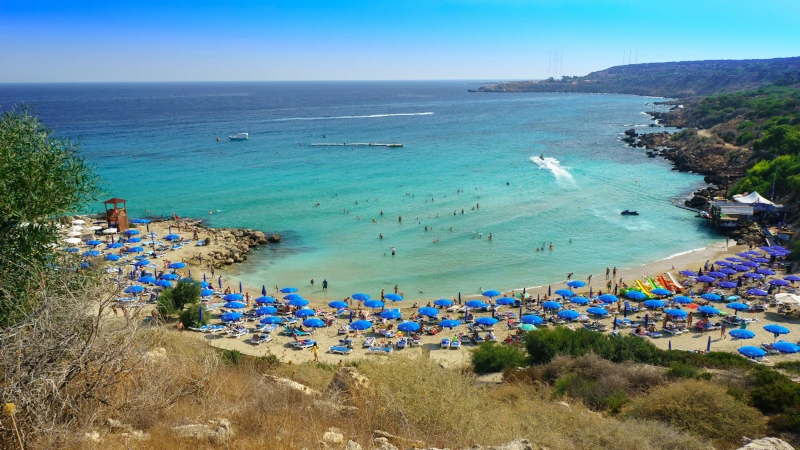 People at the famous beach of Konnos Bay Beach, Ayia Napa. Famagusta District, Cyprus