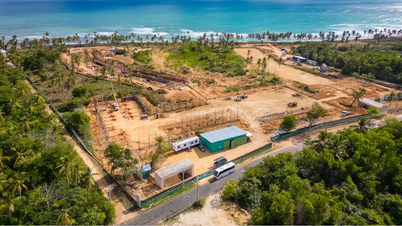 The construction site on the shore of the Caribbean sea. Start building of new all Inclusive resort on a wild tropical beach. Investing and development tourism in the Dominican Republic