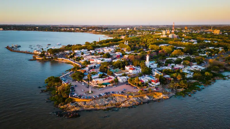 Colonia del Sacramento old city lighthouse with glowing sunrise on the Uruguay