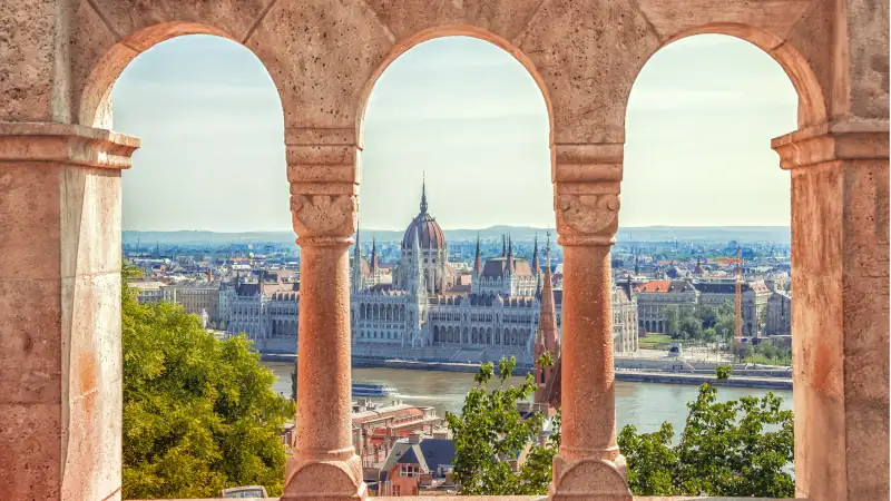 Hungary. Budapest. Parliament view through Fishermans Bastion.