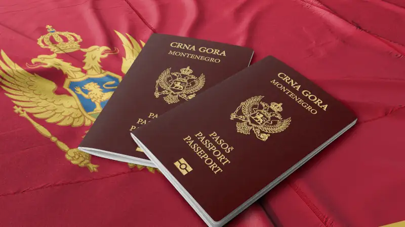 Montenegro passport on its flag, citizenship by investment