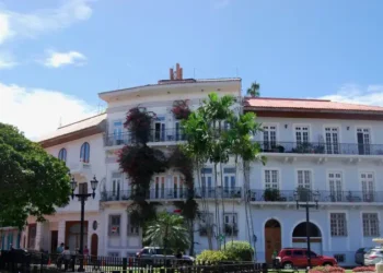 Historic colonial building with balconies and tropical plants in Casco Viejo, Panama City.