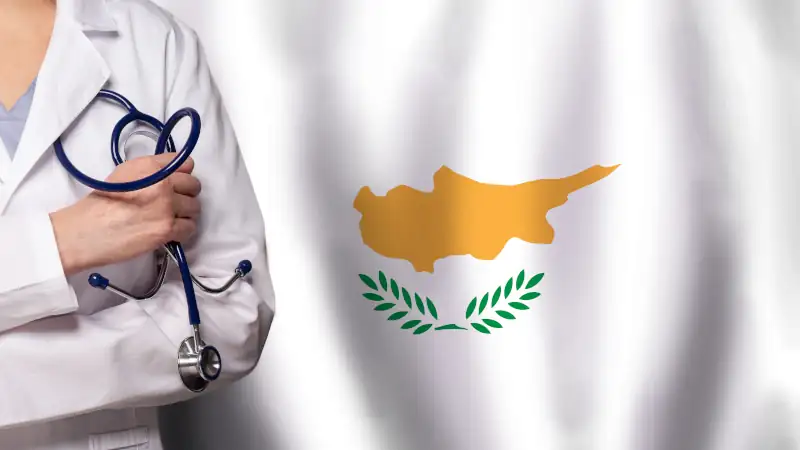 Cyprus medicine and healthcare concept. Doctor close up against flag of Cyprus background