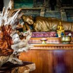 A reclining Buddha statue in a temple