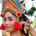 An indonesian woman dressed in local festive attire