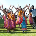 Group of people practicing Bollywood dancing