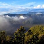 The sun shines on Indonesian hills. map of indonesia