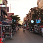 Motorcycle rickshaws line the streets of Phnom Penh, Cambodia.