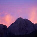 Sun sets over Cochamo peak, Chile.