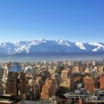 Santiago, Chile, backed by snowy mountains.