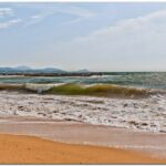 Waves crash on the coast of France.