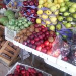 Fresh kiwis and apples in a Belize market