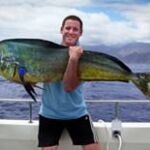 Fisherman with a mahi