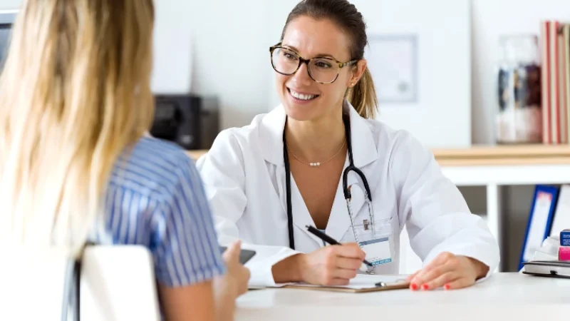 Female doctor explaining diagnosis to her patient. health care in Famagusta